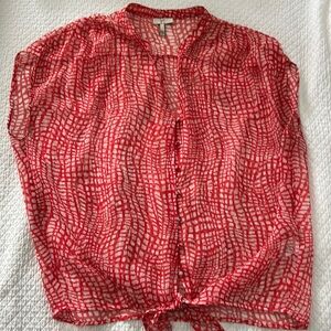 Joie size large silk orange pattern, with tie in front.